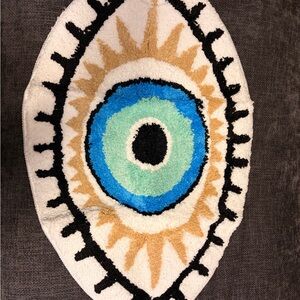 Eye Design Rug with Blue and Tan Accents